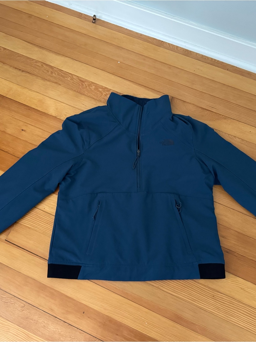 The North Face women’s Blue Half-Zip Pullover reversible fleece/ windbreaker
